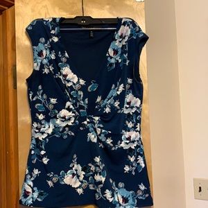 Sleeveless teal shirt
